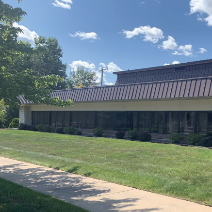 An image of the exterior of the Escanaba location