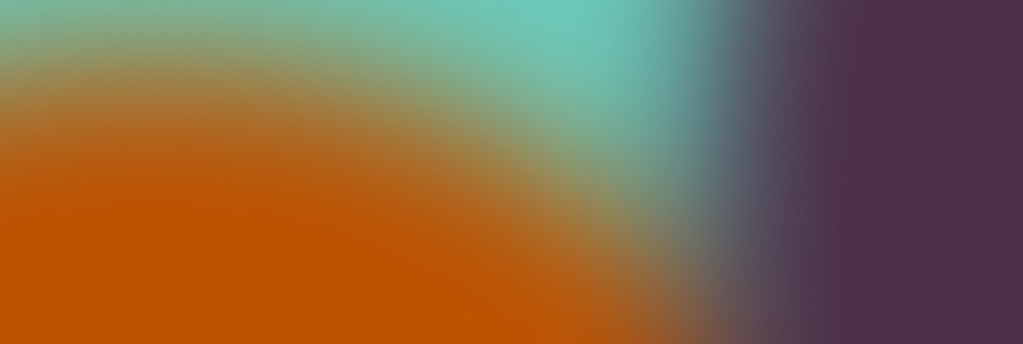 Blurred background of orange, purple, and teal