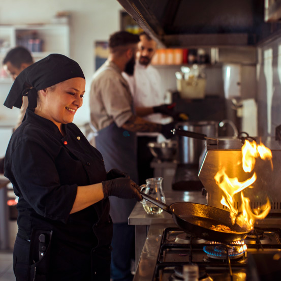 Chef cooking in commercial kitchen