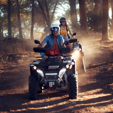 People riding ATVs