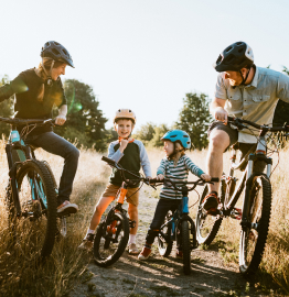 Image of a family all on bicycles