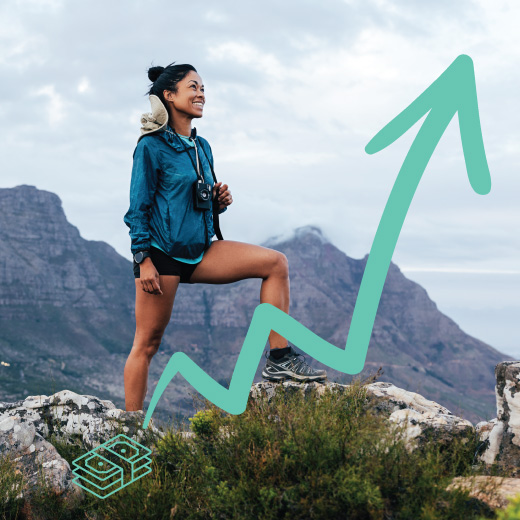 Woman climbing mountain.