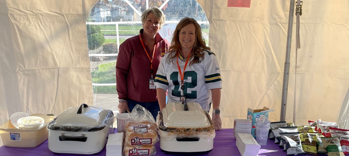Image of Brenda Lippens and Jamie Johnson at a tailgate party event