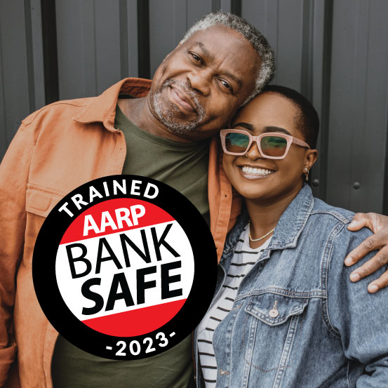 Image of father and daughter with graphic that reads "Trained AARP Bank Safe 2023"