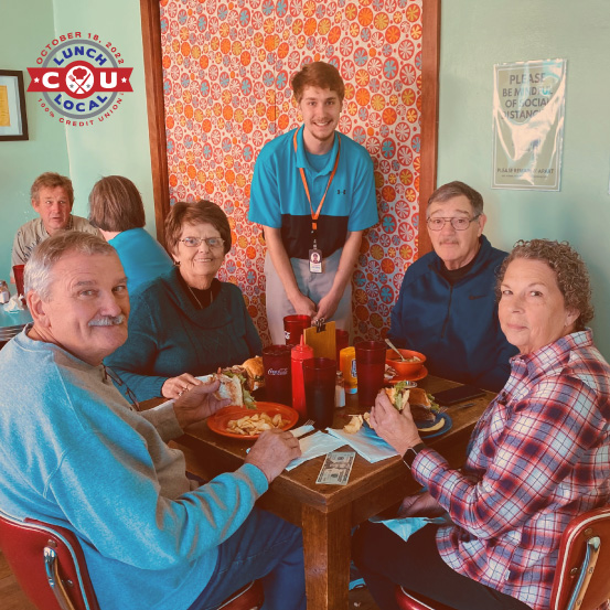 Image of a group of adults eating a meal at Donckers