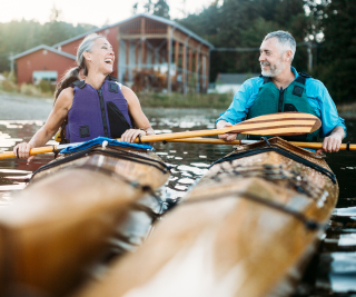 Image of two adults kayaking