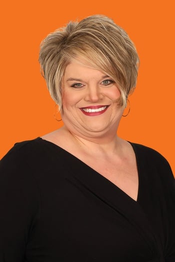 Colette headshot on orange