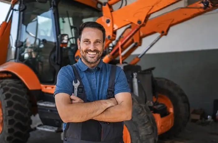 Man standing infront of equipment