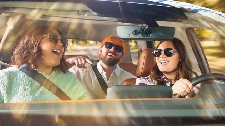 People Singing IN car
