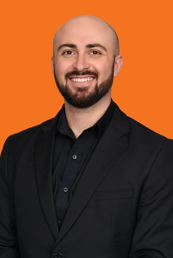 Rob headshot on orange