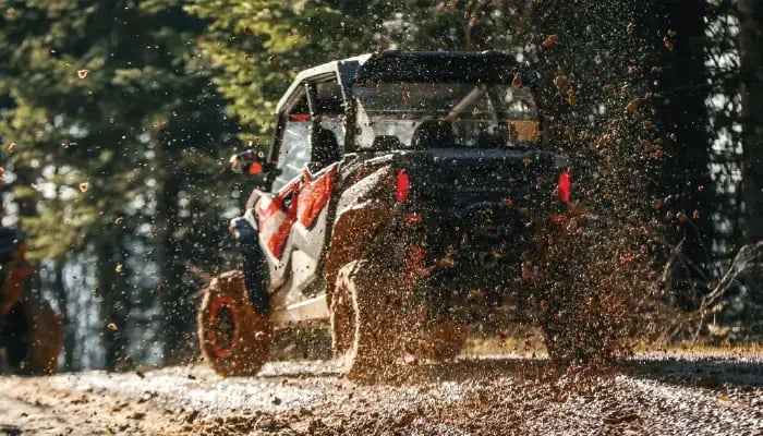 Side by side ATV in the woods
