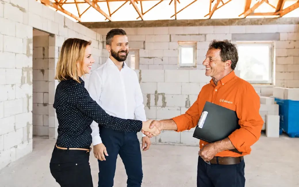 Business Owner shaking hands with local lender