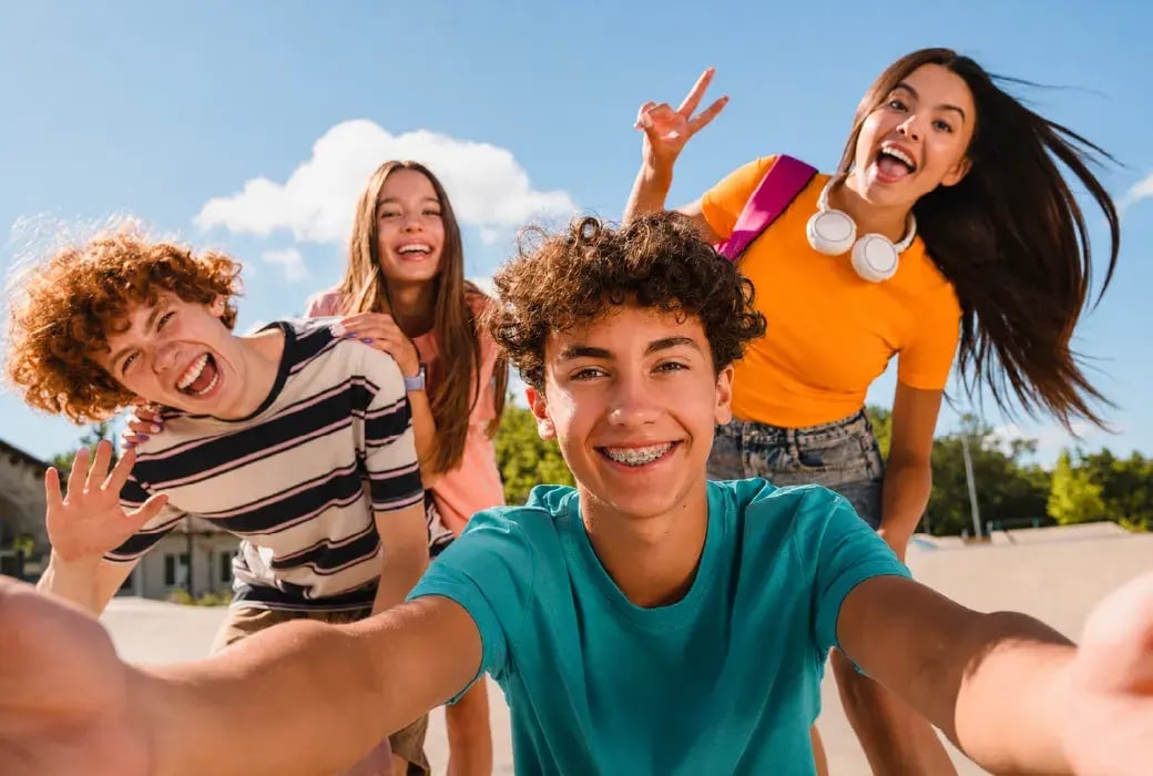 Teens taking selfie