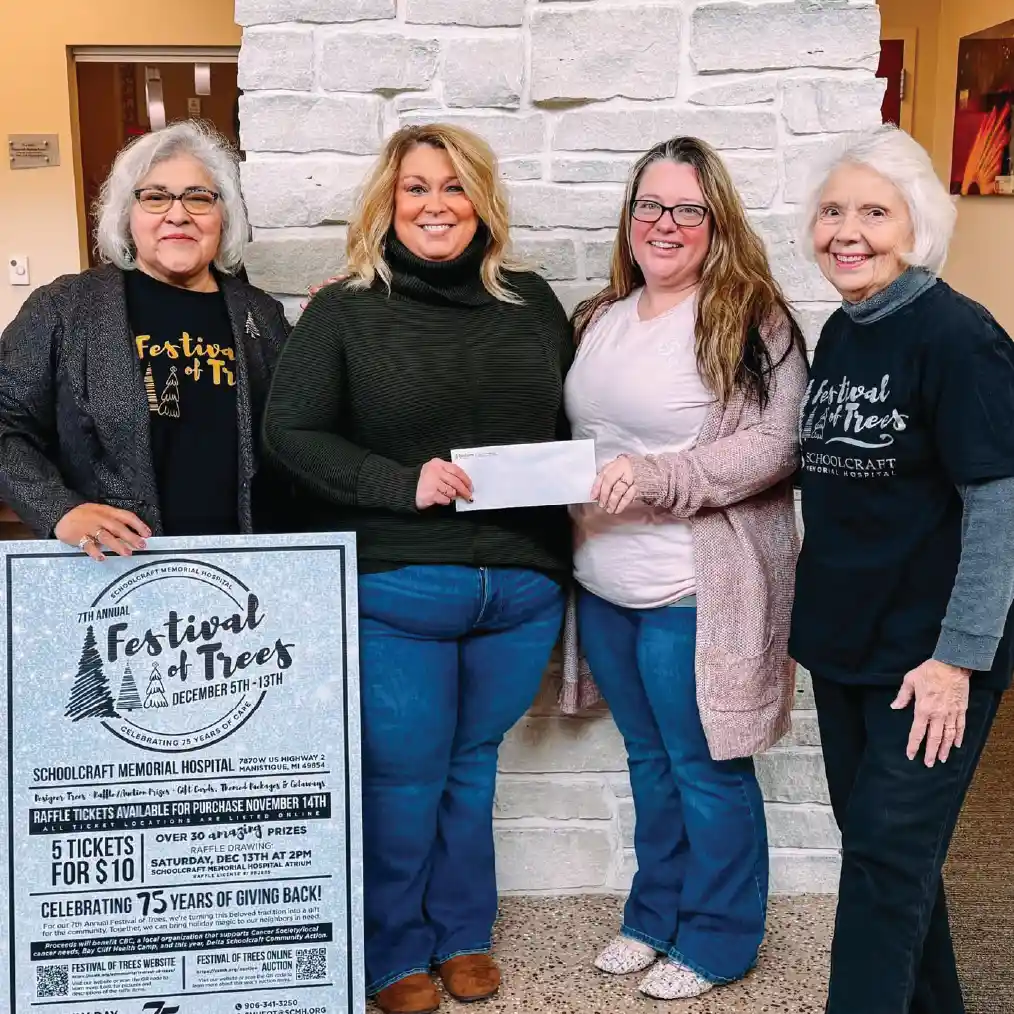 Magan presenting check